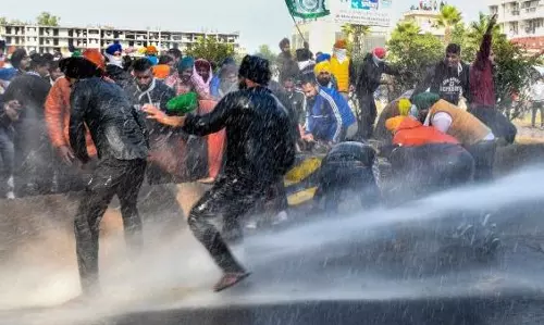After a rough day, farmers halt in Panipat close to Delhi