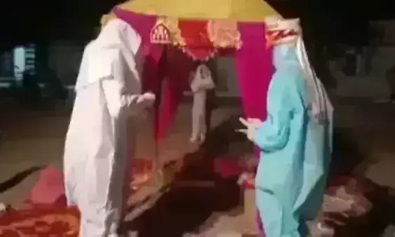 Rajasthan couple ties knot in PPE kits after bride tests positive for COVID-19