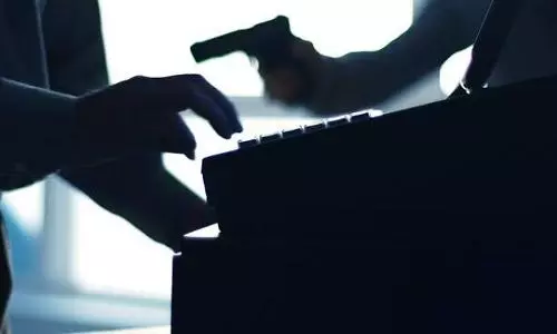 Armed gang robs 25 kgs of gold from Muthoot Finance branch in Hosur