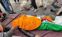 Farmers claims that a bullet has hit a farmer driving a tractor