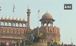 Flags installed by farmers continue to fly at Red Fort.