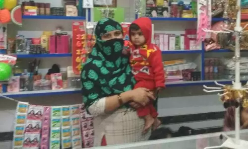 Imrana at her cosmetic shop