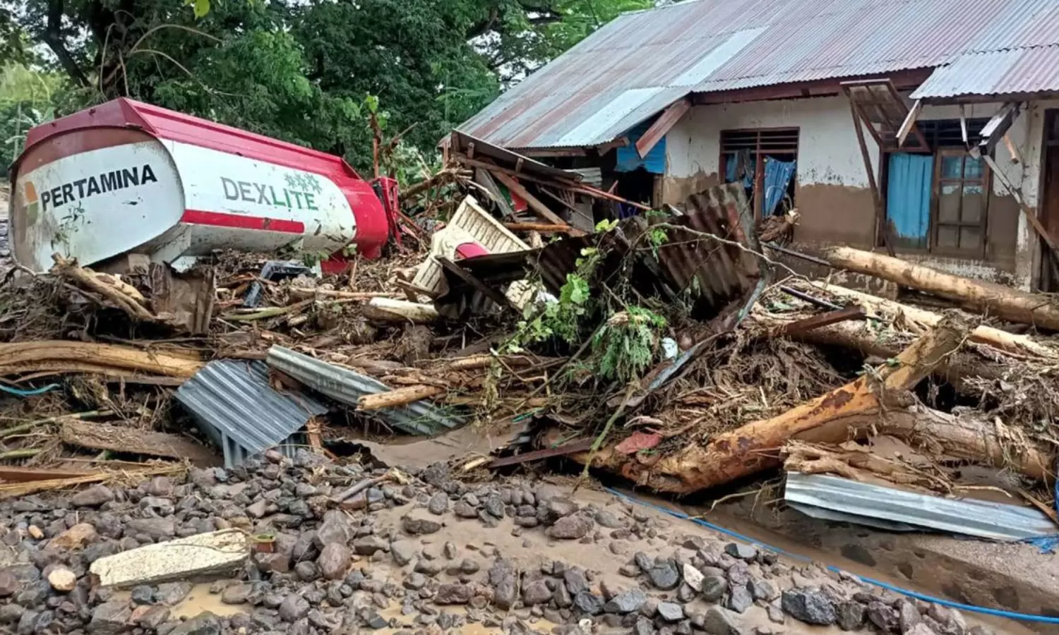 Over 100 dead in Indonesia landslides, floods