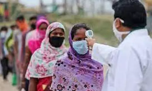 India reported 1,61,736 new Covid-19 cases, 879 deaths in 24 hours