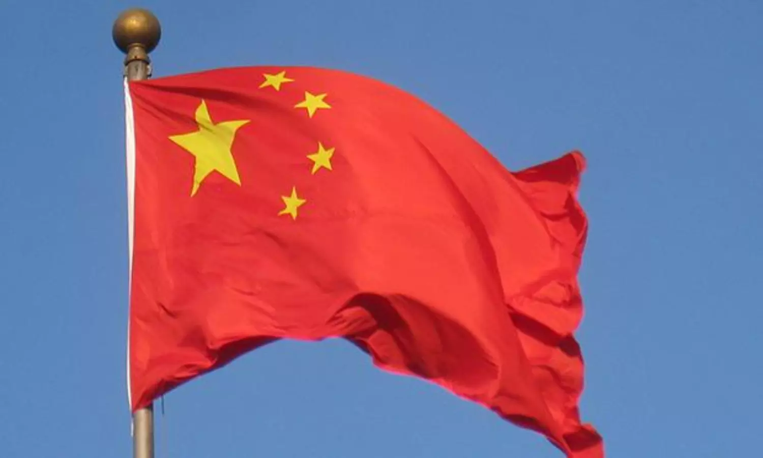 China approves three-child policy