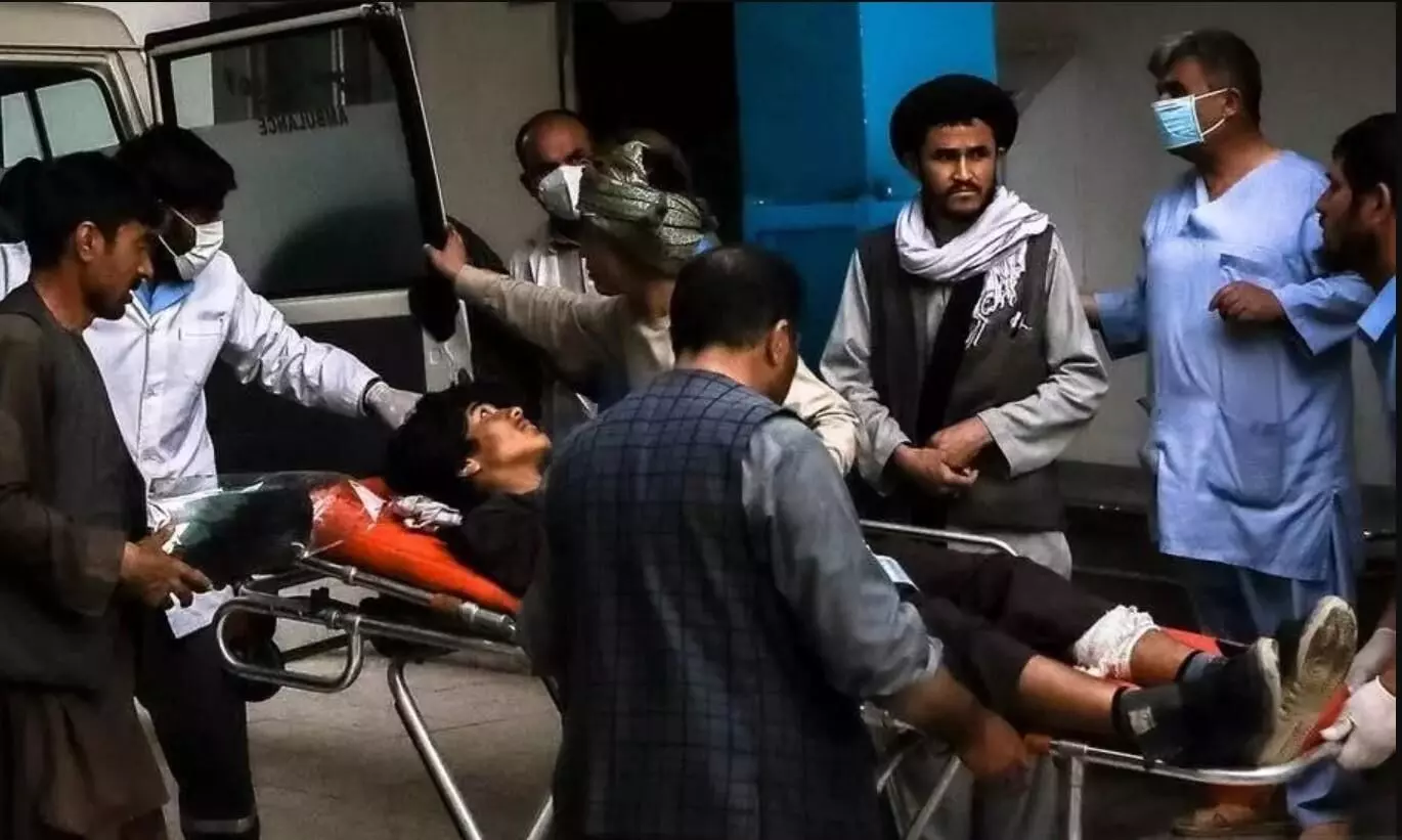Bomb attack at Afghan school kills 58, death toll expected to rise