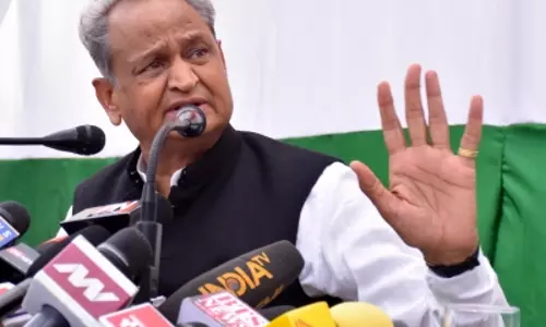 Rajasthan CM accuses MP of slowing vaccination drive for records