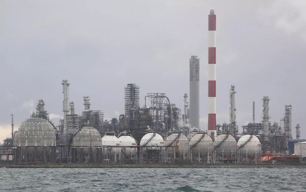 Indian national, associate jailed for siphoning oil from Shells Singapore refinery Indian national, associate jailed for siphoning oil from Shells Singapore refinery