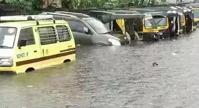 Heavy rain causes waterlogging in Mumbai: Trains, buses restricted