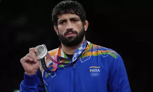 Wrestler Ravi Kumar Dahiya settles for  silver in 57kg freestyle as he loses final bout to Russias  Zaur Uguev