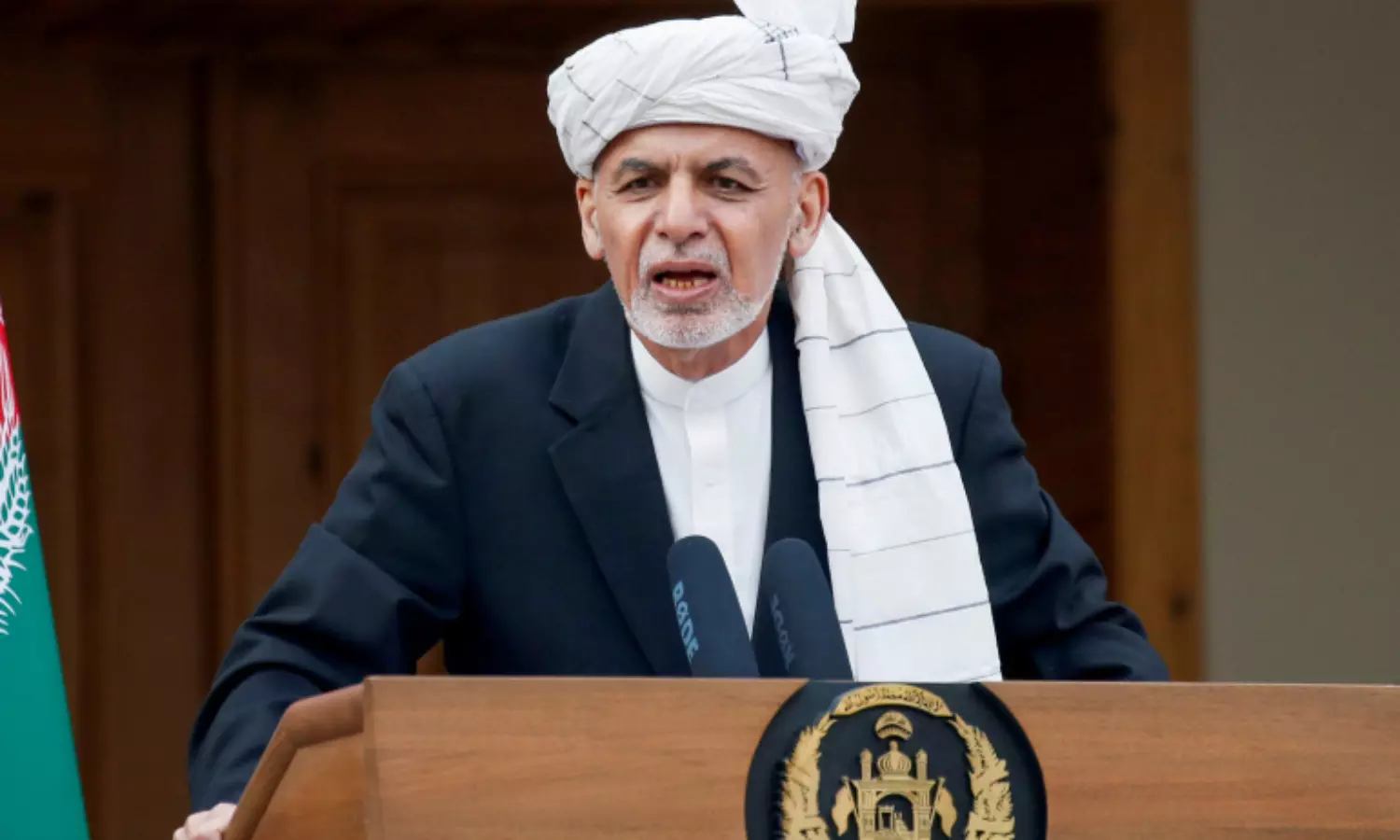 Ashraf Ghani says,  he had no chance to put on his shoes
