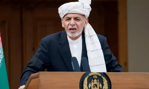 Ashraf Ghani says,  he had no chance to put on his shoes