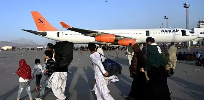 Over a thousand stuck at Afghan airport for flight clearance Over a thousand stuck at Afghan airport for flight clearance
