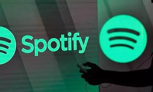 Spotifys Enhance feature to put suggested songs in your playlists