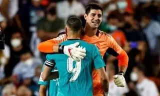 Real Madrid overcome Valencia to go top of La Liga table