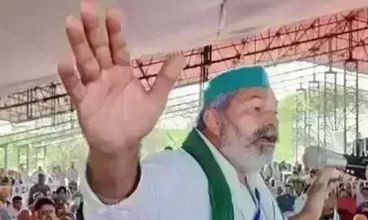Protest will continue till the farm laws are repealed: Tikait warns Union Govt