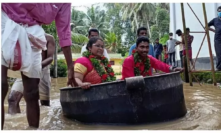 Kerala Rains: Bride and groom go to marriage hall in cooking vessel