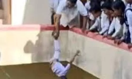 Viral video of class 2 boy dangled by foot leads to UP principals arrest