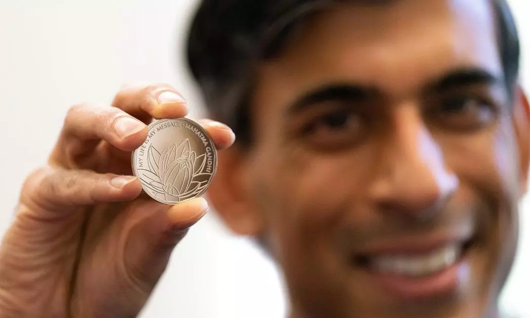 UK unveils first official coin commemorating Mahathma Gandhis life