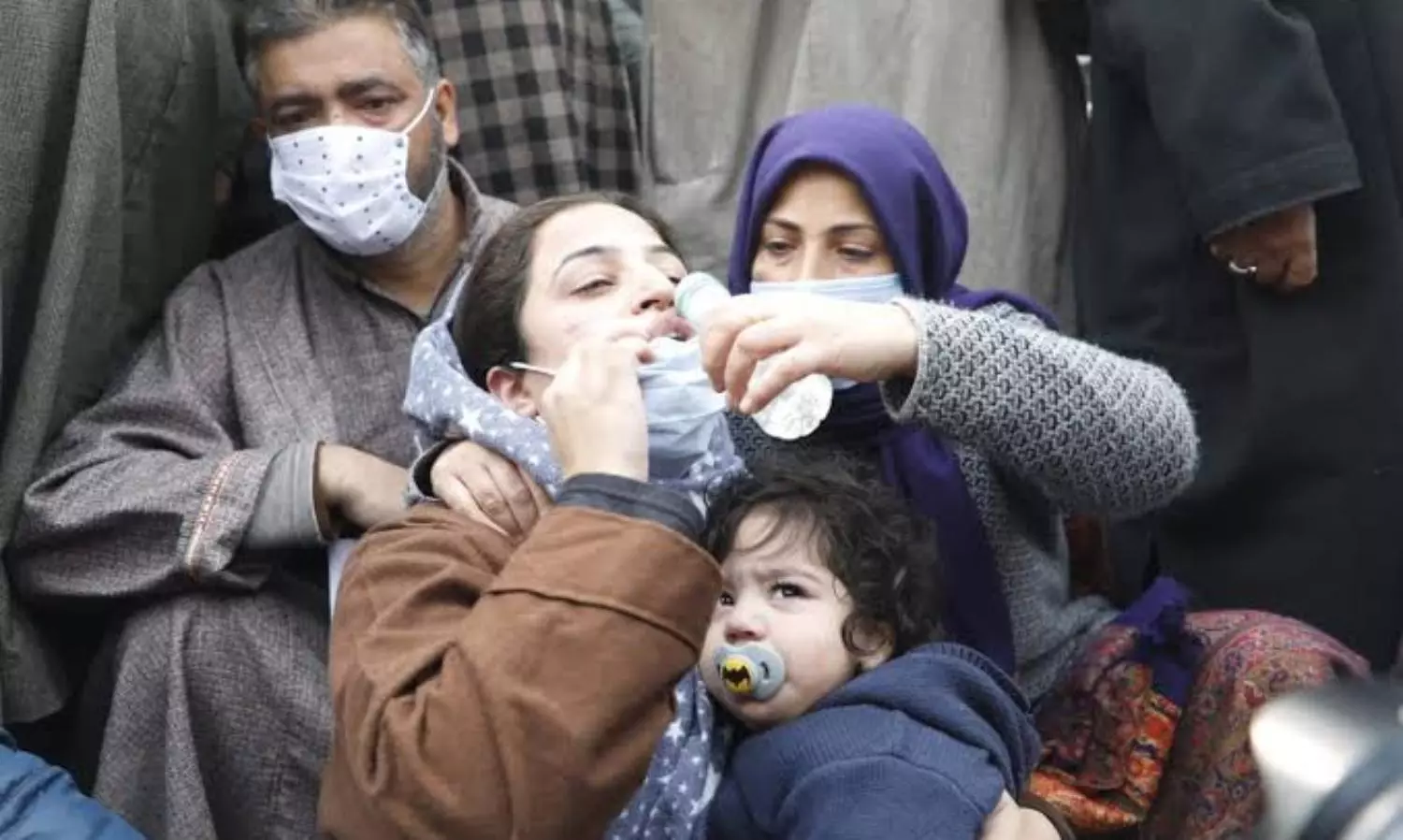 Families of Kashmiri men killed in raid removed from protest site