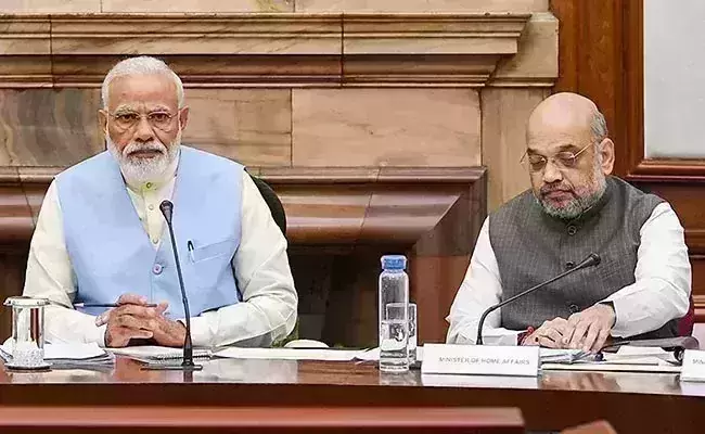 PM Modi and Amit Shah meet States top cops in Lucknow