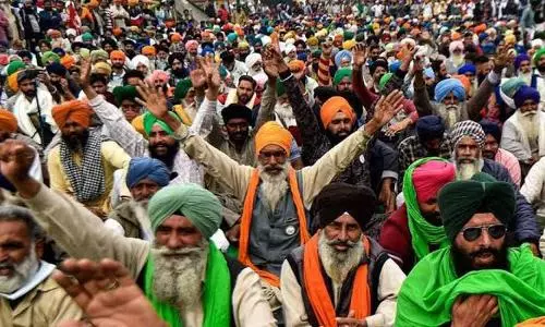 Farmers to hold victory march today after year-long protest comes to end
