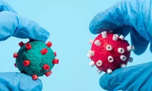 WHO warns of a tsunami of cases from Omicron, Delta variants