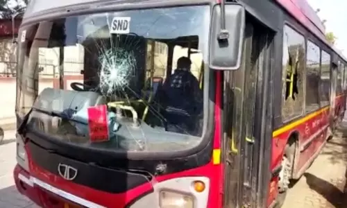 Angered at 50% capacity limit, people block road, vandalise bus in Delhi
