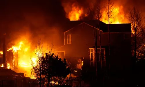 Three people missing in Colorado after massive fire