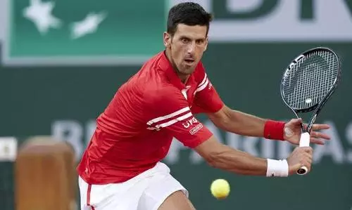 Djokovic spends second day in custody over Australian vaccine exemption row