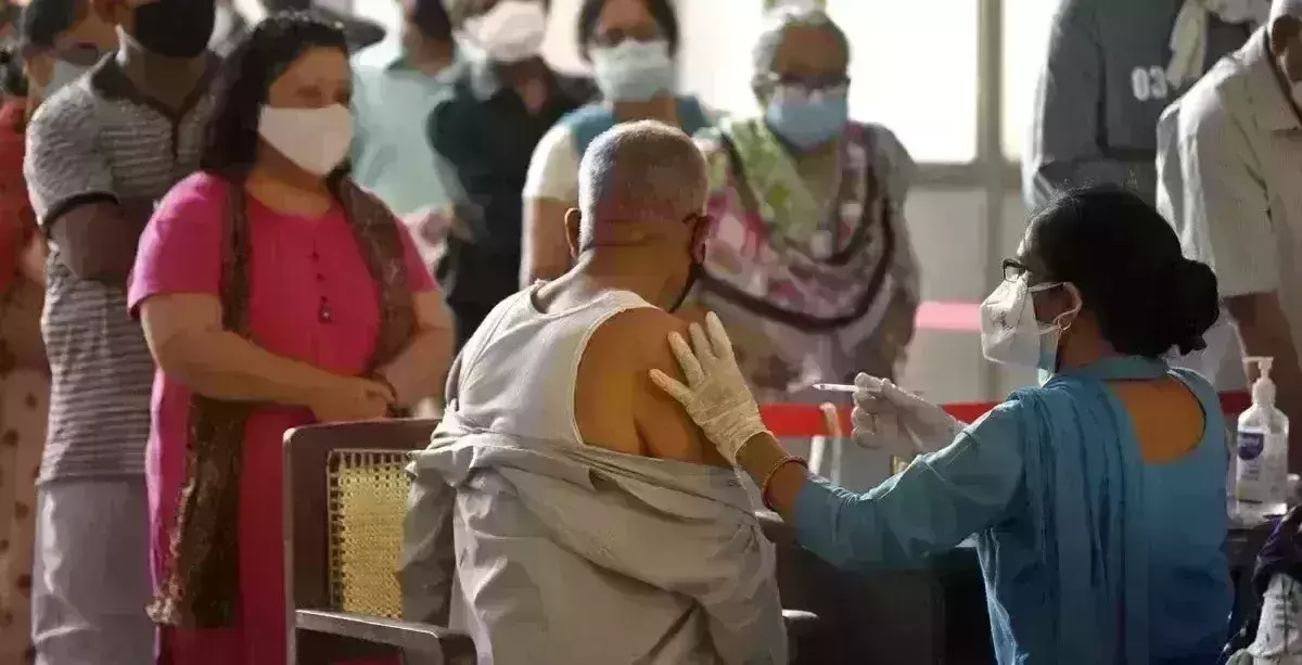 In huge spike, India records 2.4 lakh cases; Omicron tally at 5,488