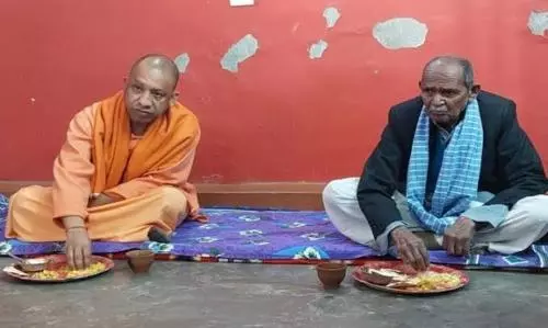 Samajwadi party of social exploitation says Yogi Adityanath on visit to Dalit household