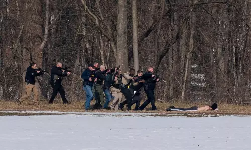 Shootout at US college: 2 officers, 1 student dead