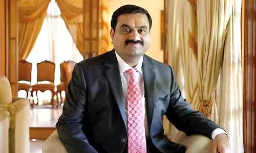 Gautam Adani becomes Asias richest person overtaking Mukesh Ambani