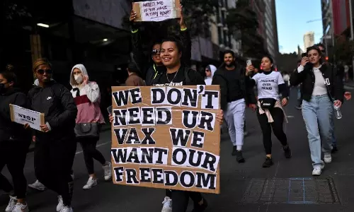 Protesters amass in Australia denouncing vaccine rules