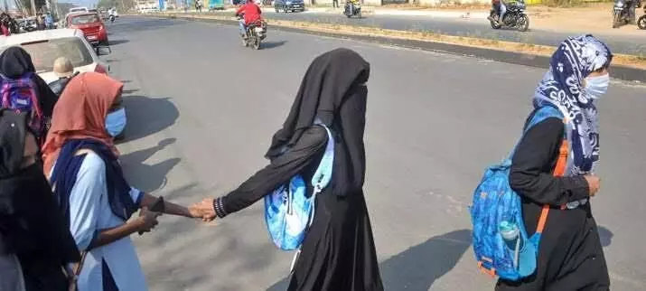 Karnataka bans hijab, saffron scarves in state-run minority institutes