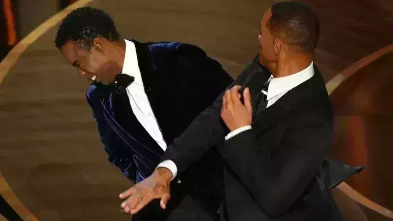 Will Smith punches Chris Rock at Oscars 2022