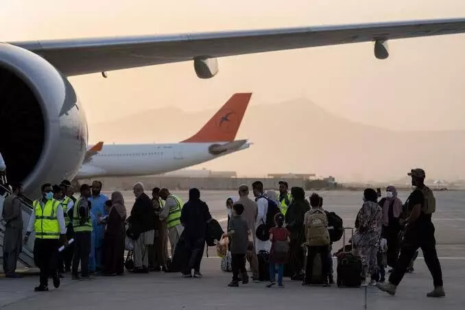 New Taliban order restricts women from flying without male relative