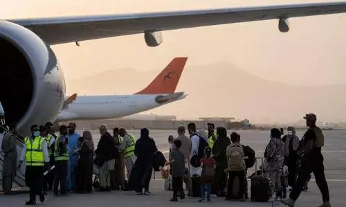 New Taliban order restricts women from flying without male relative