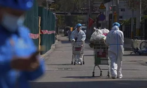 Shanghai starts Chinas biggest lockdown in 2 years as Covid cases surge