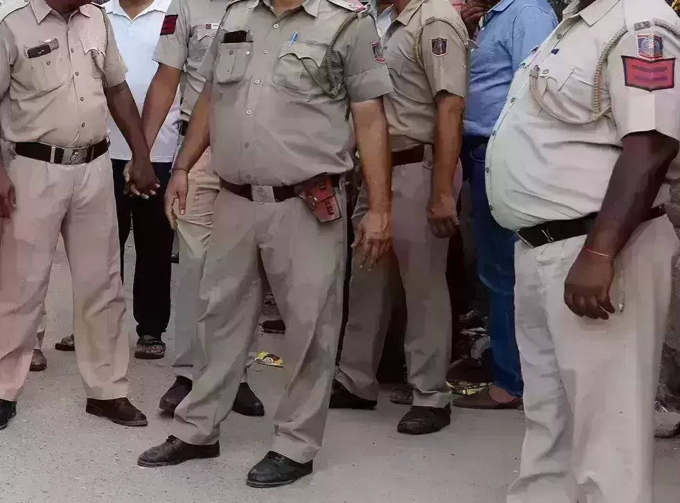 UP Man chases cops at Gorakhnath temple with sickle