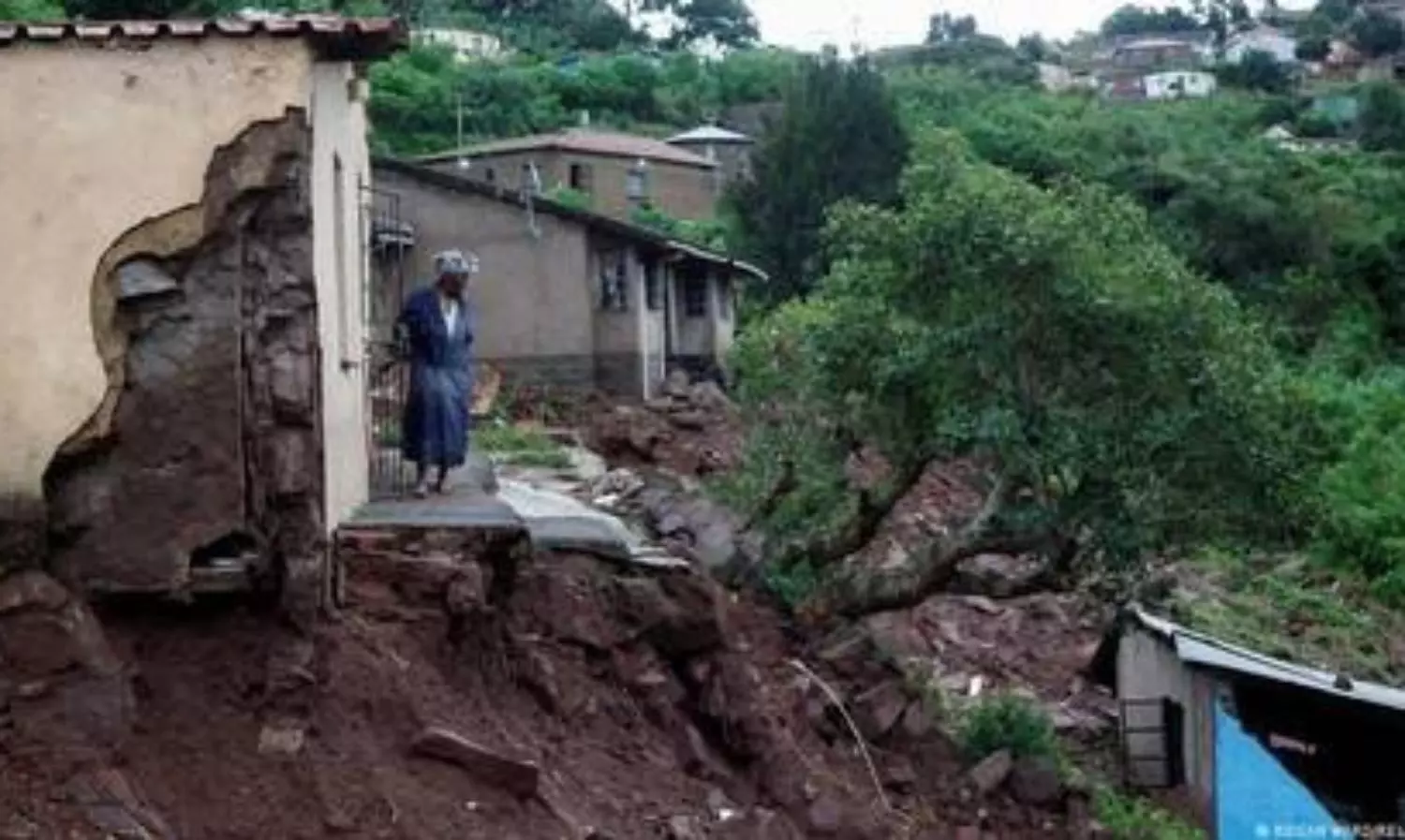 South Africa flood toll nears 400, rescuers widen search for missing