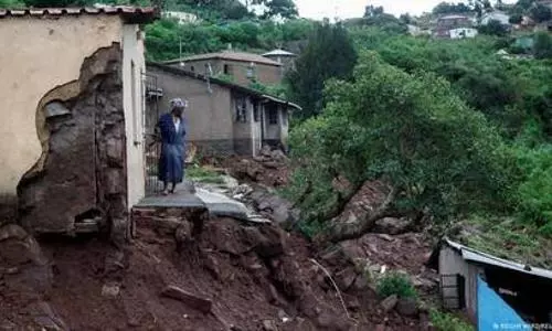 South Africa flood toll nears 400, rescuers widen search for missing