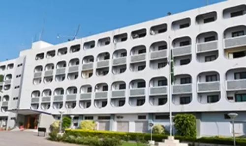 Pakistans ex-envoy dismissed for sexually harassing female colleague