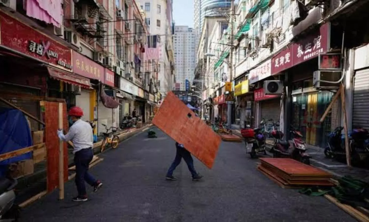 Shanghai eases Covid curbs after two months in step toward returning to normalcy