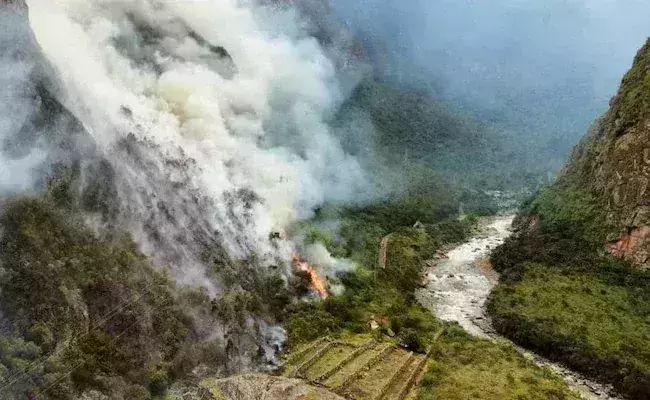 Ancient Incan ruin of Machu Picchu under threat of forest fire