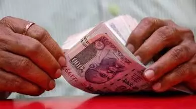 Rupee rises 6 paise from all-time low of 80.05; closes at 79.92 against US dollar