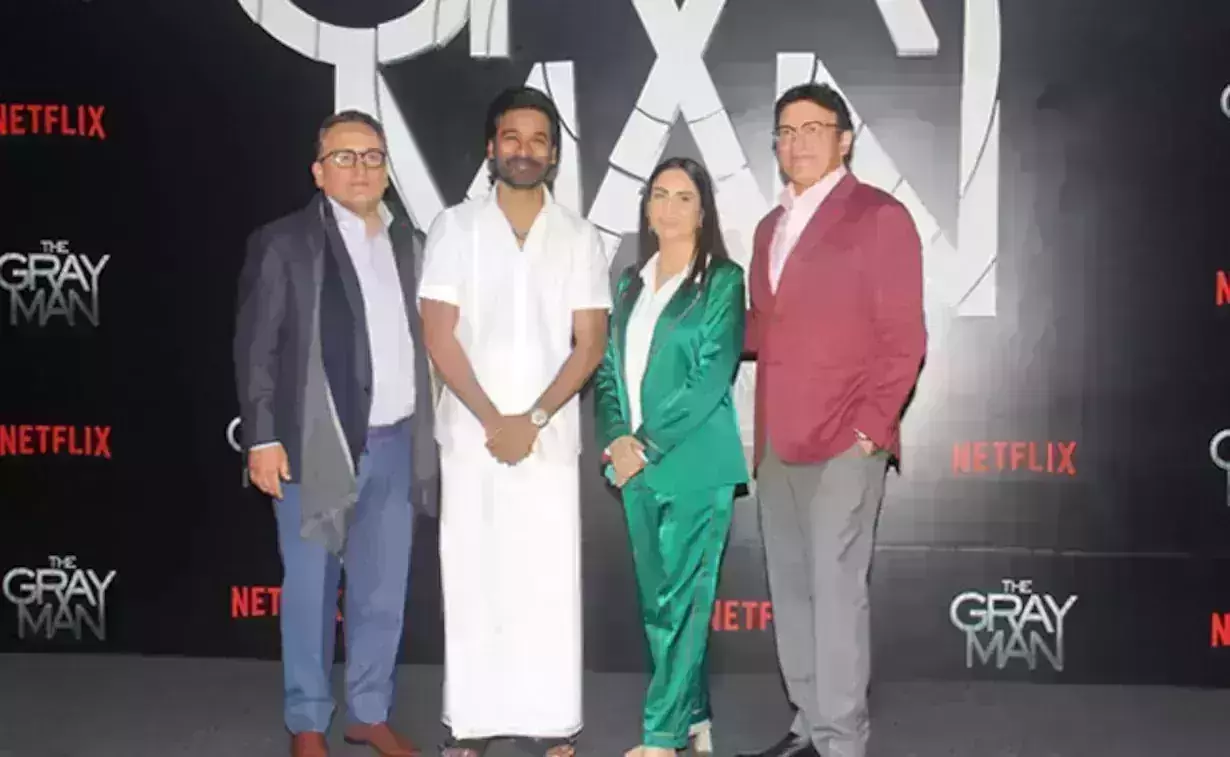 Dhanush represents Tamil culture at The Gray Mans premiere, Wears traditional veshti sattai