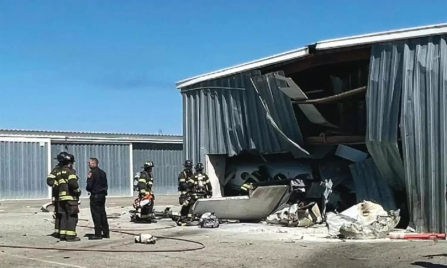 At least two dead after two planes crash in midair while trying to land