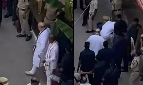 Telangana BJP chief carries sandals for Amit Shah, critics say servitude mentality